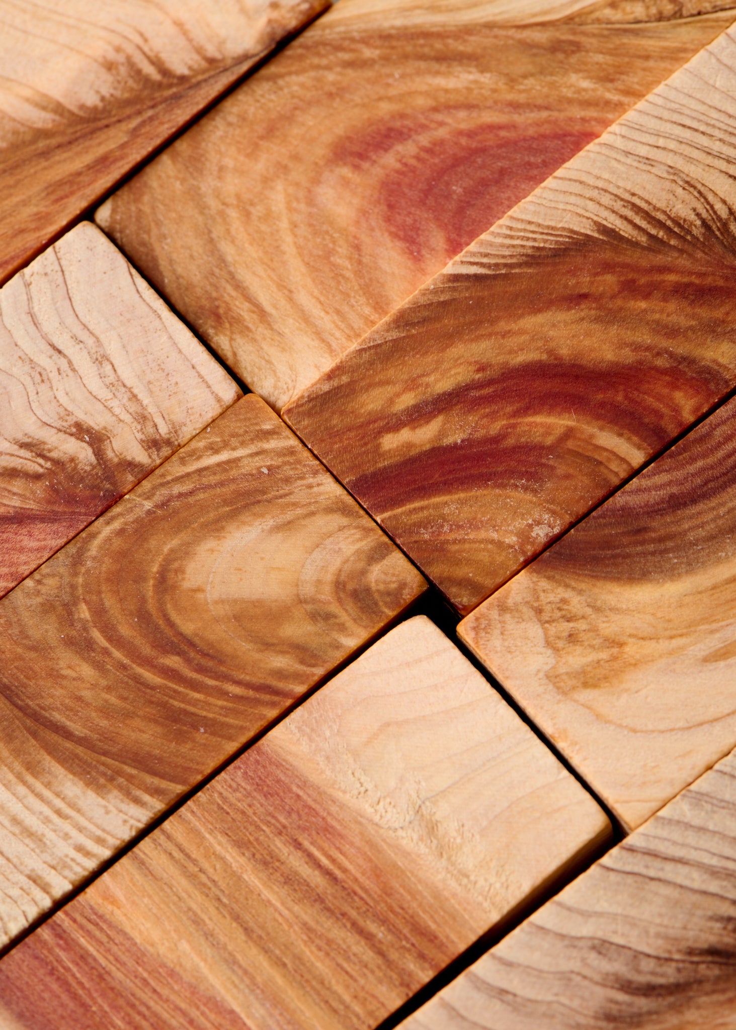 Close-up of Hinoki wood blocks, highlighting natural grain and resin-rich surface.